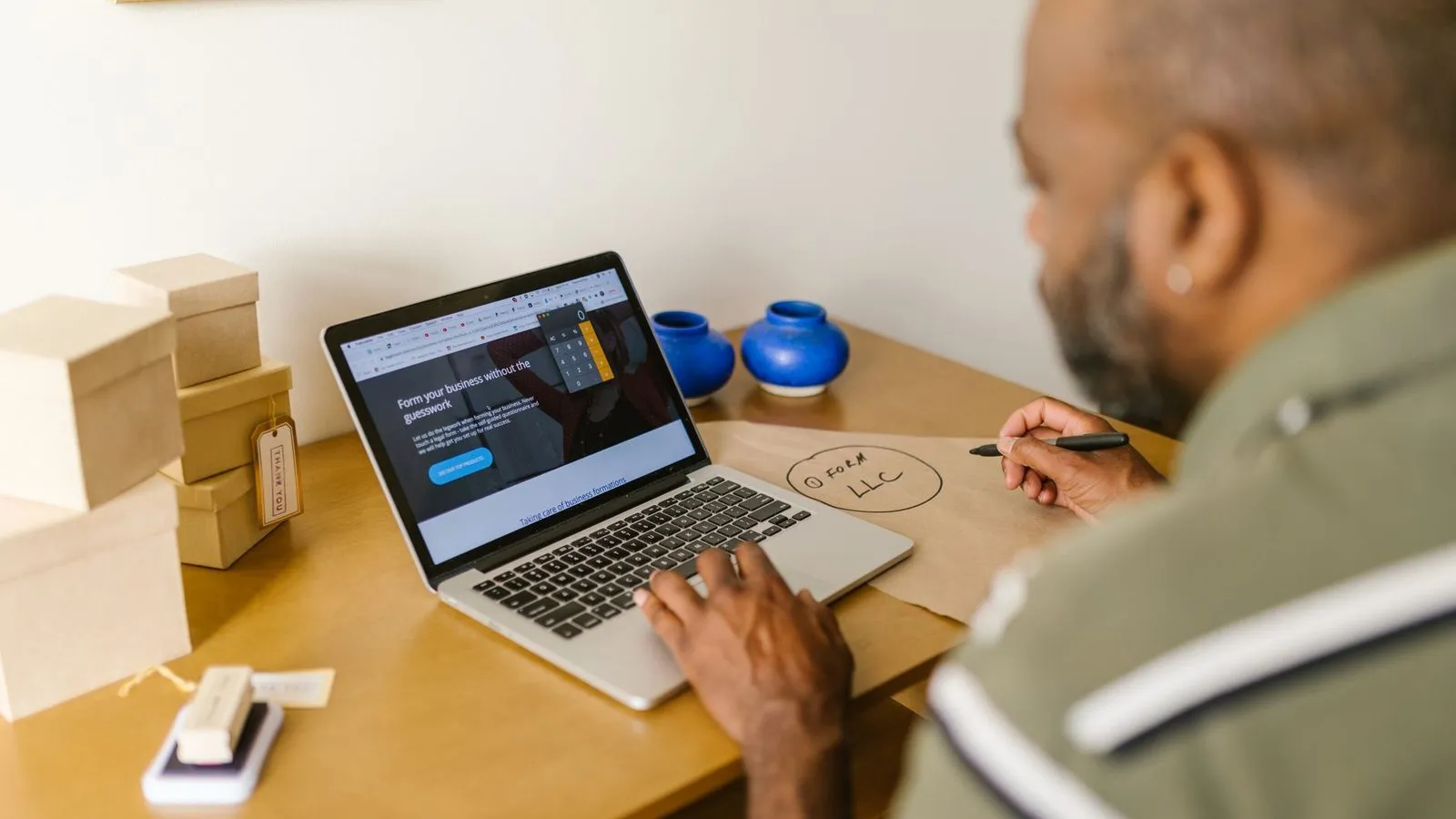 Small business owner planning an affordable website design package for a Redding, CA business