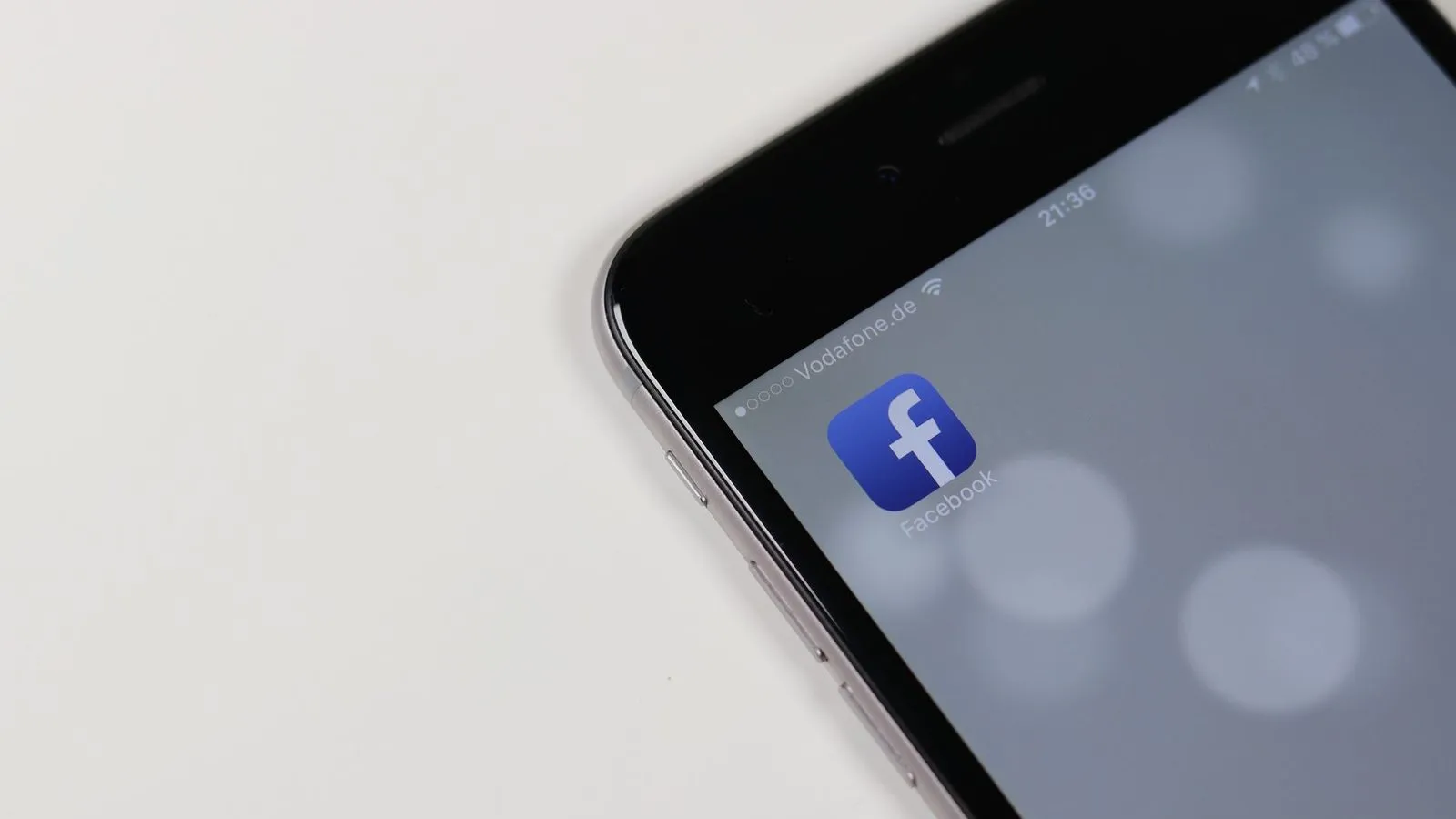 Facebook app on a smartphone, representing Facebook ads for local businesses