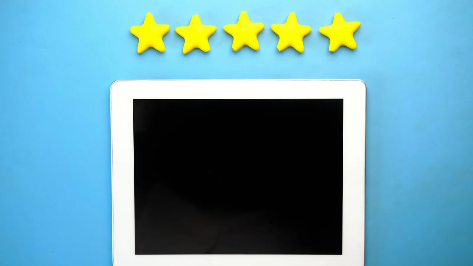 Tablet showing a five-star rating, representing online customer reviews